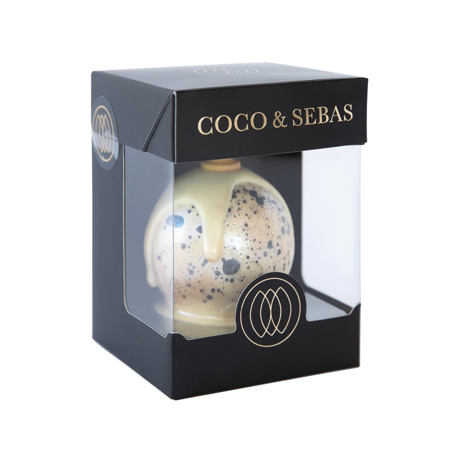 Kerstballetje van witte chocolade in verpakking