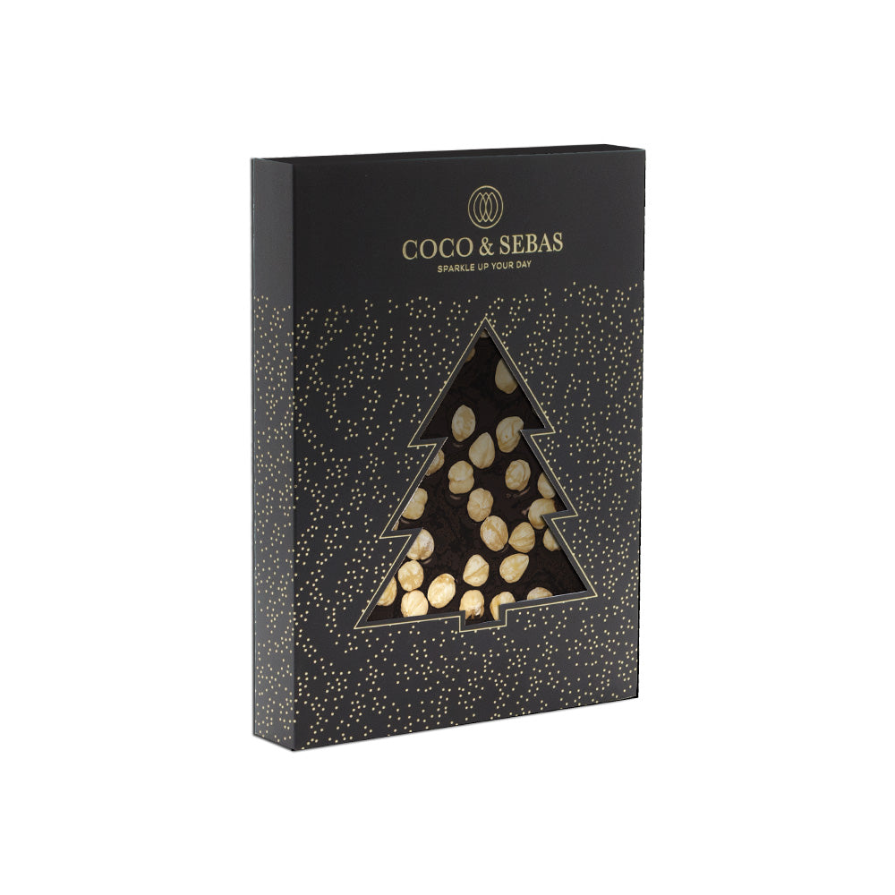 Plak pure chocolade met hazelnoten en kerstsleeve