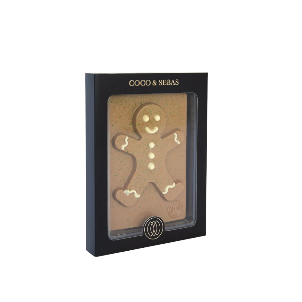 Peperkoekman op plak van karamel chocolade